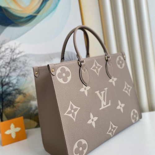 Louis Vuitton Bicolor Monogram Empreinte Leather Onthego MM M45494