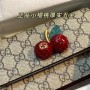 Gucci GG Supreme mini bag with cherries