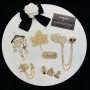 Chanel CC Signature Brooch